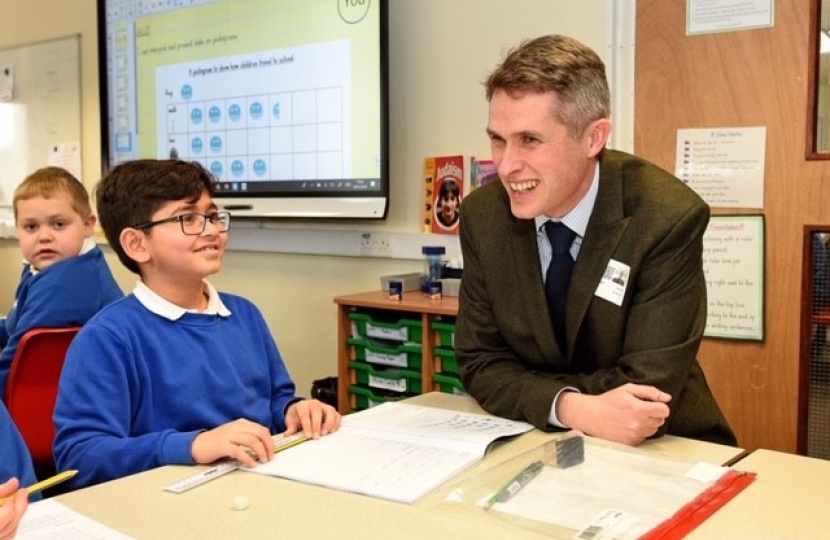 Gavin Williamson MP, chatting to pupils