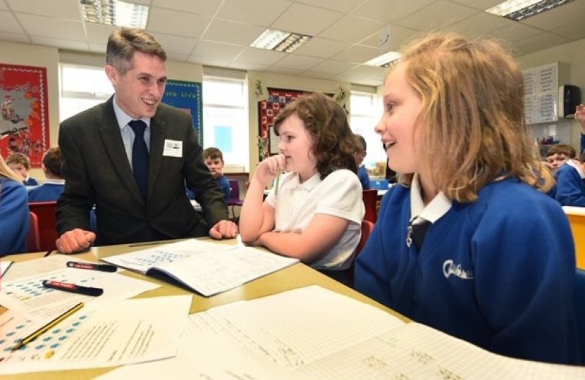 Gavin Williamson MP, chatting to pupils