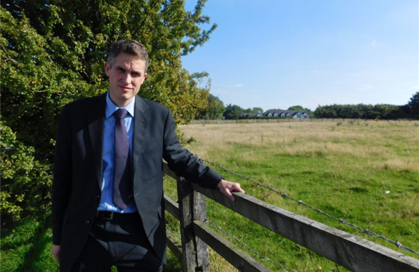 Gavin near an area of green field land