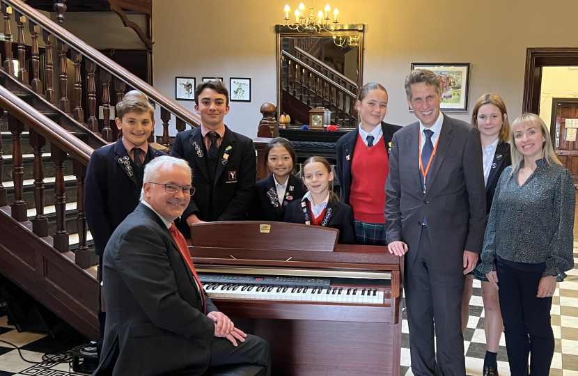 Sir Gavin with the choir and Headteacher 