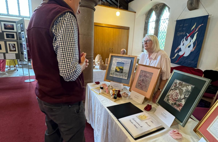 Sir Gavin Williamson visiting Wheaton Aston's art exhibition