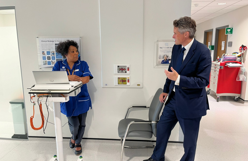 Sir Gavin Williamson talks to staff members from Beacon Park Hospital