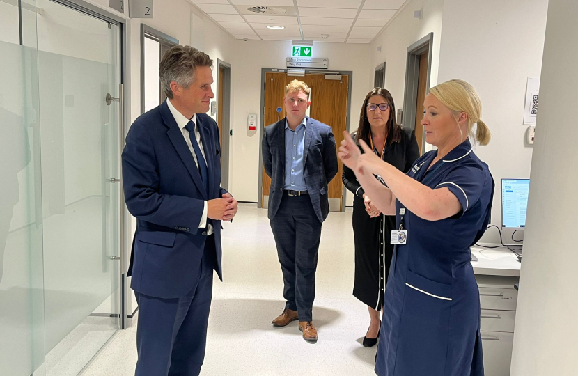 Sir Gavin Williamson is joined by staff members from Beacon Park Hospital