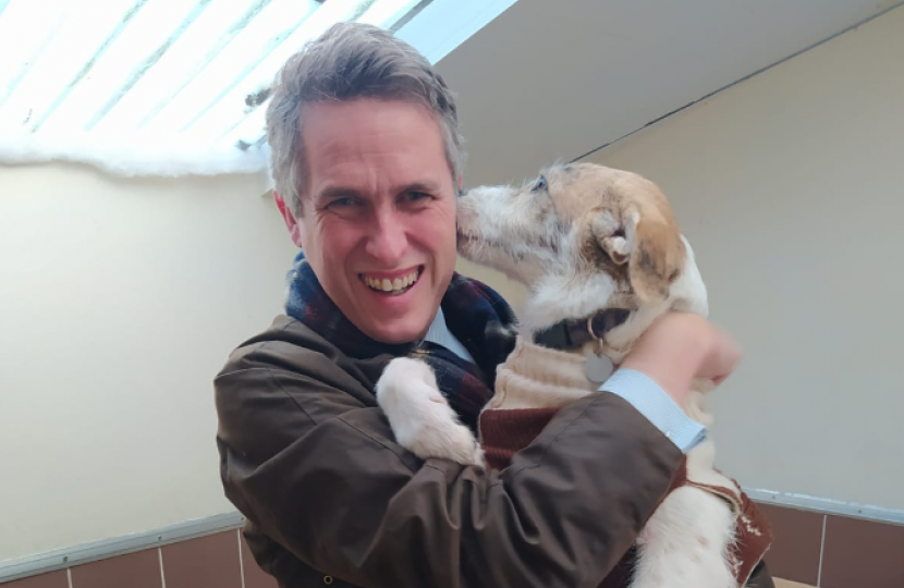 Sir Gavin Williamson is joined by one of the residents at the centre