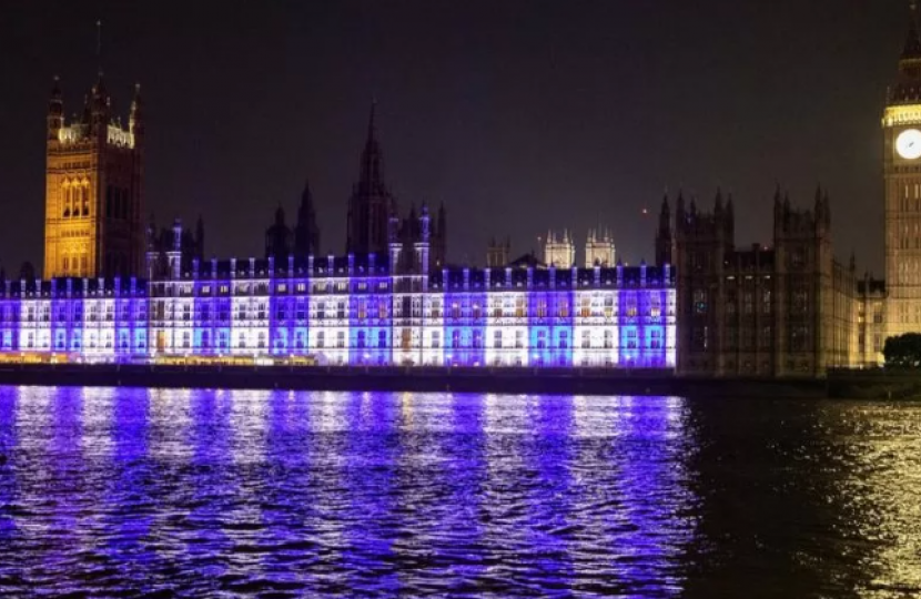 The Palace of Westminster lit up on Monday evening in the colours of the Israeli flag