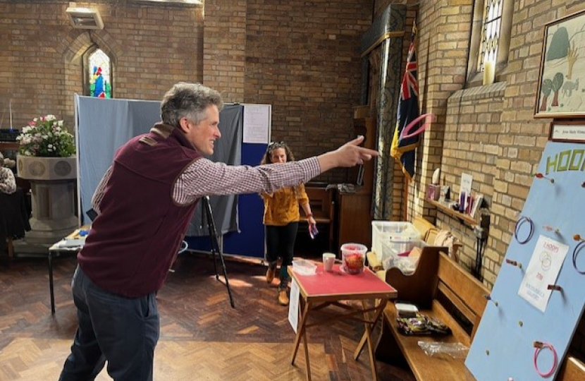 Sir Gavin Williamson taking part in fair games