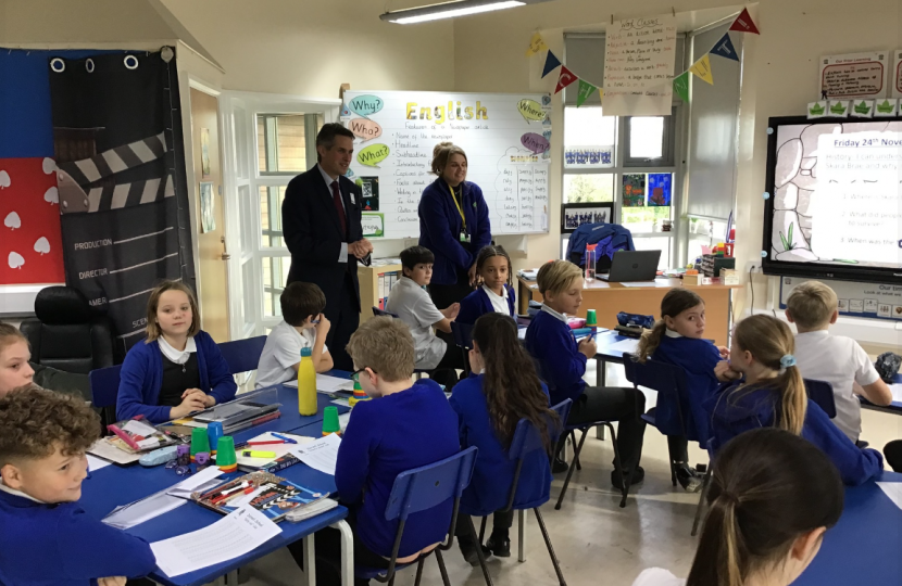 Sir Gavin Williamson is joined by teachers and pupils from Landywood Primary School