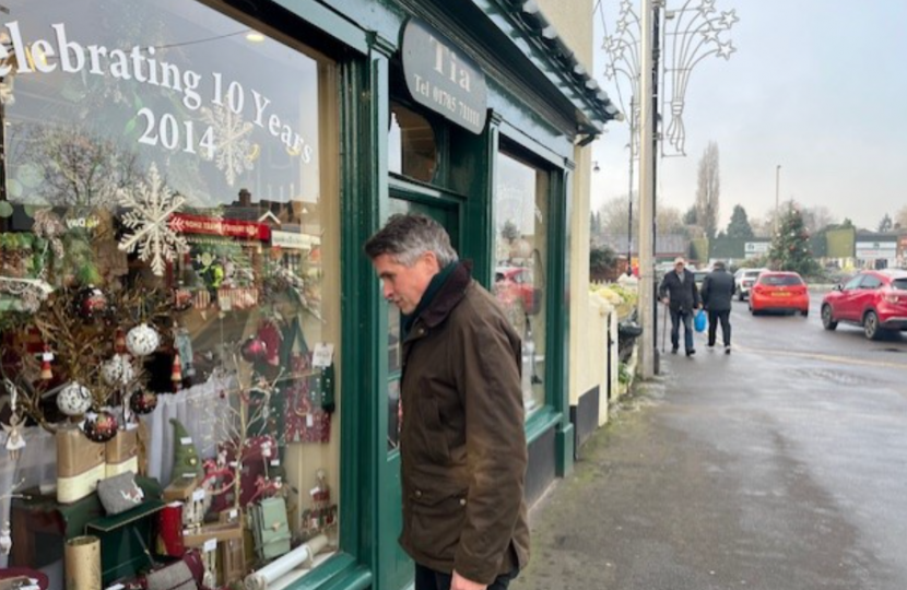 Sir Gavin Williamson outside Tia, a gift shop in Penkridge 