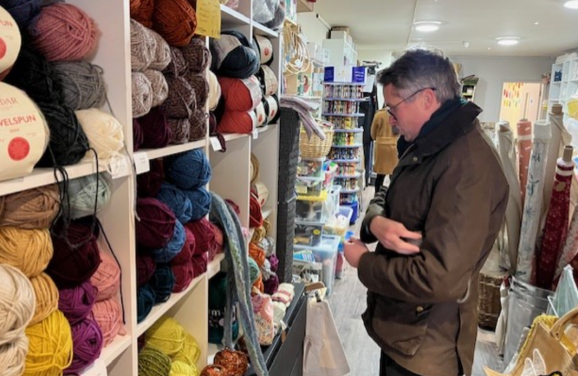 Sir Gavin Williamson perusing a local craft shop 