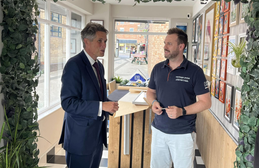 Sir Gavin Williamson is joined by a shop owner on Stone High Street