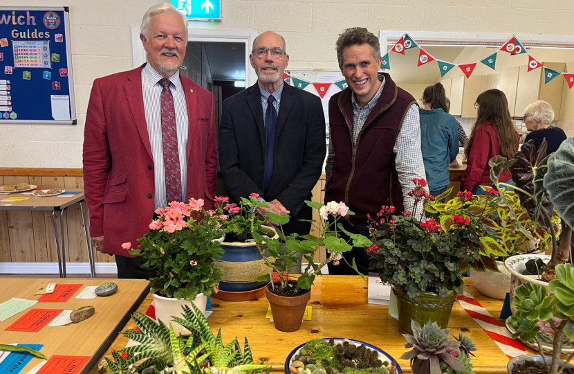 Sir Gavin Williamson is joined by participants in the Haywoods Flower and Vegetable Show