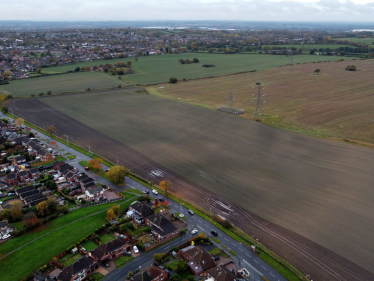 The land between Linthouse Lane and Kitchen Lane where the new housing development is being planned.