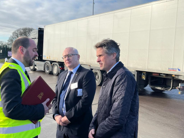 Sir Gavin Williamson is joined at The Hollies Truckstop by Parliamentary Under-Secretary of State for Roads and Transport, Richard Holden, and the Cabinet Member for Highways at Staffordshire County Council, David Williams. 