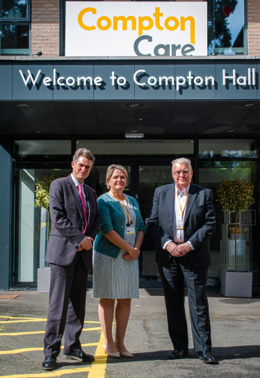 Sir Gavin outside Compton Care 