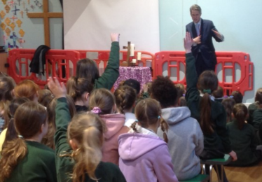 Sir Gavin Williamson is seen teaching the school children about the history of British democracy