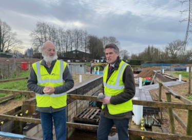 Sir Gavin Williamson is joined by volunteers from the Stafford Riverway Link project