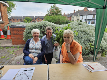 Sir Gavin Williamson is joined by residents in Cheslyn Hay